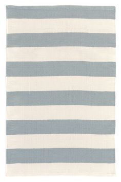 a blue and white striped rug