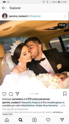 a man and woman are sitting in a car