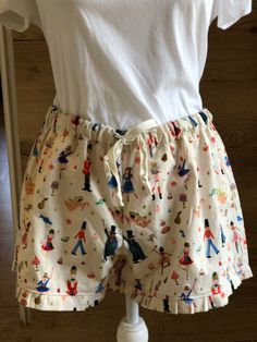 "Adorable, 100% cotton PJ Shorts, made with Rifle Paper Co. Fabric. Details: 100% Cotton  - Holiday Classics Land of Sweets Cream Elastic Waist Drawstring Ruffles at Leg Openings Sizing for Small PJ Shorts: Waist - 30\" Inseam - 3\" Length - 11 3/4\" *Please carefully review the sizing because I don't accept returns or exchanges Care: Fabric is pre-washed to minimize shrinkage Machine wash and dry, press with warm iron if desired All items are created and sewn by me in my smoke-free home!  Thank you for visiting my shop. Watch for new items by following me on Instagram at: https://www.instagram.com/limestmerchant/"