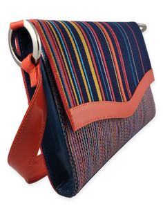 This handcrafted shoulder bag by Kuskaya is joyfully bright and playful. What makes it special is that it is a one-of-a-kind creation and incorporates handwoven textiles created using centuries-old techniques. With a classic and sleek silhouette, it’s a piece that is durable and can last a lifetime. A wonderful gift for any handbag lover - including yourself. Product Details: Composition: 100% Mercerized Pima Cotton & Leather Trim Fabric Hand-Woven on Wooden Looms using centuries-old techniq