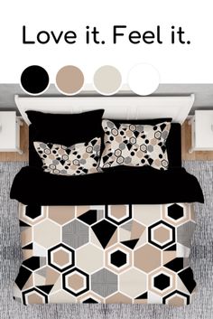 a bed with black and white pillows on it