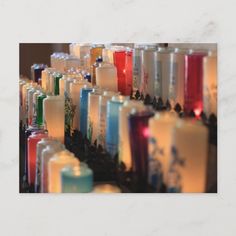 many different colored candles are lined up together