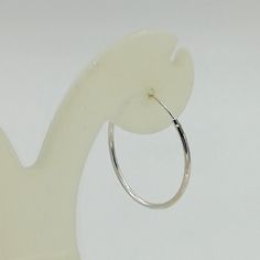 ** Please go through all the pictures i have posted for a listing to get an exact idea of the actual size of the item.Sterling silver ear hoops.Dimensions: 25 X 1.2mmPrice listed is for a PAIR of hoops.These earrings are made of 925 hypoallergenic sterling silver. Most of my pieces come with a 925 stamp.Can be packaged in a gift box. I can include a personal message from you if needed_______________________________________You are welcome to contact me at...   bhavnakwintra1956@gmail.com_________ Simple Hoop Earrings For Gift, Hypoallergenic Sterling Silver Hoop Earrings, Hypoallergenic White Gold Hoop Earrings, Silver Minimalist Single Hoop Earring, Everyday White Gold Hoop Earrings, Silver Hoop Earrings With Ear Wire For Everyday, Sterling Silver Hoop Earrings For Everyday, Simple Small Hoop Sterling Silver Earrings, Minimalist Small Hoop Sterling Silver Earrings