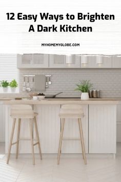 white kitchen with wood accents and bar stools