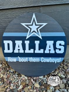 a wooden sign that says, dallas how bout them cowboys