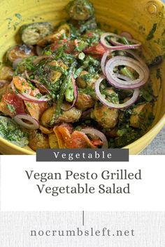 vegan pesto grilled vegetable salad in a yellow bowl with text overlay