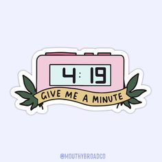 a pink clock sticker with the words give me a minute written on it in gold lettering