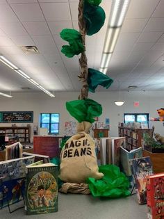 a bag that is sitting in the middle of a room with books on the floor