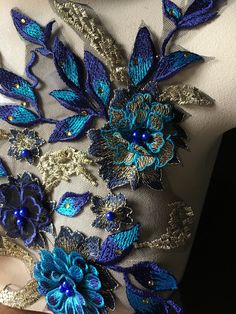 "Fine net 3D embroidered lace with ROYAL BLUE, TEAL & GOLD embroidered flowers and leaves ... amazing dimension and a stunning style! * About 16\" x 11\" wide overall. More lace, stretch lace, appliques, flowers, leaves and other lovelies located here: LACES: http://www.etsy.com/shop/MaryNotMartha?section_id=6414105 STRETCH LACES: http://www.etsy.com/shop/MaryNotMartha/search?search_query=STRETCH+LACE&search_submit=&search_type=user_shop_ttt_id_5464080&shopname=MaryNotMartha APPL Fitted Blue Embroidered Fabric With Floral Design, Fitted Blue Fabric With Floral Embroidery, Fitted Blue Floral Embroidered Fabric, Blue Embellished Fitted Embroidered Fabric, Fitted Blue Embellished Embroidered Fabric, Blue Lace Embroidered Fabric For Party, Blue Wedding Embroidered Fabric With 3d Embroidery, Blue 3d Embroidered Fabric For Wedding, Descendants Dr