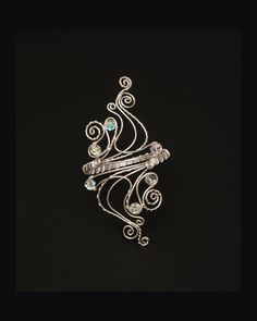 "Add a stylish and individual touch to your outfits with one of my hand crafted arm cuff. Beautiful  and elegant arm cuff is carefully handcrafted made out of silver plated copper wire, and wrapped with  swarovski crystal  10mm. Measurement :  The length of design is 6 inches and  armcuff is adjustable from  is 7.5\" to 15.50\" in circumference. Arm Bracelet or bracelet cuff is easily adjusted with light pressure to custom fit your arm . For measuring the right sizing, please use a string or tap Unique Silver Cuff Bracelet For Party, Modern Twist Silver Jewelry For Party, Silver Wire Wrapped Bangle Cuff Bracelet, Adjustable Silver Fusion Cuff Bracelet, Modern Twist Silver Wire Wrapped Jewelry, Silver Fusion Bracelets For Party, Silver Spiral Metal Cuff Bracelet, Wire Wrapped Bangle For Party, Wire Wrapped Bangle Jewelry For Parties