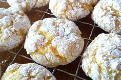 powdered sugar cookies cooling on a wire rack