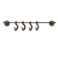 an old fashioned coat rack with three hooks on the side and four horseshoes attached to it