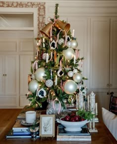 a decorated christmas tree with ornaments on it