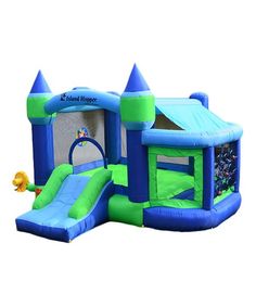 an inflatable bounce house with a slide