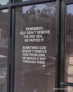 a sign on the side of a building that says, remember god didn't remove the red sea he parted it sometimes god doesn't remove our problems