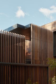 a building with wooden slats on the outside