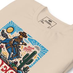 a t - shirt with an image of a cowboy on it