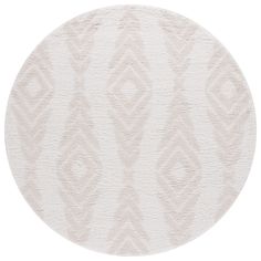 a round rug with an abstract design on the bottom in white and beige colors,