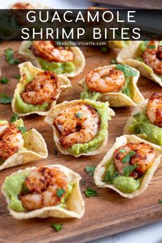 guacamole shrimp bites on tortilla shells with avocado and cilantro