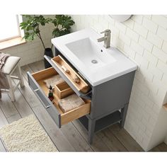 This 30" single vanity adds an elegant look to your bathroom with its sleek design and extra storage. The base is crafted from solid and engineered wood, while the countertop is made of white ceramic for a clean and polished look. This vanity comes with a rectangular sink and features a finished back for a seamless appearance. Plus, it has an open shelf and two soft-close drawers with metal hardware for your towels and toiletries. Please note that the faucet and mirror are not included, but the… Single Hole Faucet, Bathroom Vanity Set, Soft Close Drawers, Open Shelf, Single Bathroom, Plumbing Fixtures, Single Bathroom Vanity, Vanity Set, Extra Storage