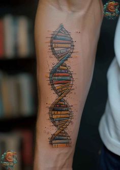 a tattoo on the arm that has a drawing of a double strand of books in it