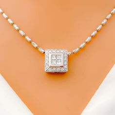 PRODUCT DETAILS Gold Purity(karat): 18k Item Weight(grams): 1.5 Item Finish: White Gold Stone: Diamond Diamond Weight(carats): 0.47ct Diamond Color: F-G Diamond Quality: VS Pendant Length: Chain Not Included White Gold Square Pendant Diamond Necklace, Luxury Sterling Silver Solitaire Necklace In Diamond White, White Gold Diamond Necklace With Square Pendant, White Gold Solitaire Square Pendant Necklace, White Gold Square Pendant Solitaire Necklace, White Gold Solitaire Necklace With Square Pendant, Classic White Gold Diamond Necklace With Square Pendant, Formal White Gold Diamond Necklace With Square Pendant, Elegant Diamond Solitaire Necklace With Square Pendant