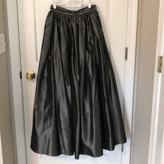 Granite Grey Full Length Taffeta Party Skirt. Back Zip With Crinoline. Fun Skirt With A Crop Top, Dressy Top Or Denim Shirt. Spring Satin Full Skirt, Spring Full Satin Skirt, Spring Evening Flowy Petticoat, Spring Evening Petticoat Skirt, Fitted Full Skirt In Satin, Fitted Full Satin Skirt, Fitted Satin Full Skirt, Voluminous Long Skirt Petticoat For Party, Long Satin Skirt For Prom