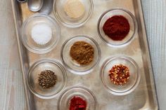 a tray filled with different types of spices