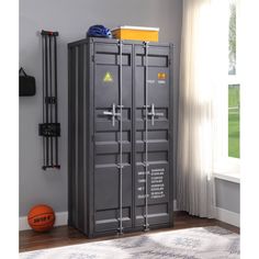 two lockers in the corner of a room with a basketball ball on the floor