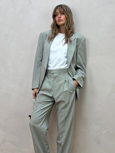 Brand: Corneliani Trend Line Size: 38R chest, 30inch waist - blazer fits like womens: M - L Measurements: blazer chest 40inch, sleeve 24inch, length 31inch, shoulder 18inch trousers waist 30inch, leg 30inch, rise 11.5inch, hips 38inch Colour: light green Fabric: pure virgin wool (jacket is part lined) Flaws: some small marks (Lisa's height is 5.9”/177cm, usually wears size UK 8-10 small/medium) Please note that all vintage & second hand items may have some signs of wear. Any defects or damages t Light Green Suit, Grad Suits, Green Suit Women, Prom Fits, Graduation Suit, Green Outfits For Women, Linen Suits Women, Light Green Fabric, Wedding Fits