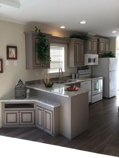 the kitchen is clean and ready for us to use in its new owner's home