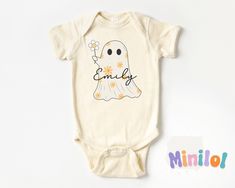 Personalized Halloween Cute Ghost Onesie®, Baby Name Halloween Outfit, Custom Halloween Natural Bodysuits for Girls, Custom Kids Fall Shirts 🌼 All Onesie® are 100% Certified Ultra Soft Organic Cotton The organic cotton fiber used in our Baby Onesie® has been certified and meets globally recognized standards for organic fiber. HOW TO ORDER v Choose a onesie® or shirt size (sizing chart below) and sleeve length. RAGLANS ARE ONLY IN SIZES 2T AND UP v Select design color if applicable v For personalized designs - enter customization in the "Add your personalization" field v ADD TO CART v Select from our shipping class options. Onesie® are printed on Gerber organic. These tend to run small so we recommend sizing up if you are on the fence. Toddler shirts are true to size. ONESIE® SIZES 0-3 Mon Cute White Onesie With Character Print, White Onesie Halloween Costume, Cute Cotton Halloween Bodysuit, Cute Cotton Halloween Onesie, Playful Halloween Onesie With Cartoon Print, Fitted White Onesie For Fall, Fitted White Bodysuit With Character Print, Fitted White Onesie With Character Print, Fitted White Onesie With Cartoon Print