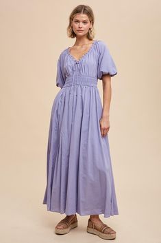 Lavender Smocked Puff Sleeve Maxi Dress Casual V-neck Maxi Dress With Gathered Sleeves, Modest V-neck Dress With Smocked Back, Billowy Maxi Dress With Smocked Back, Billowy Smocked Back Maxi Dress For Daywear, Billowy Smocked Dress With Short Sleeves, Billowy Maxi Dress With Smocked Back For Daywear, Flowy Maxi Dress With Gathered Short Sleeves, Billowy Maxi Dress With Smocked Back And Puff Sleeves, Flowy Smocked Bodice Maxi Dress With Short Sleeves