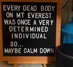 a sign that says every dead body on mt everest was once a very determined individual so maybe calm down