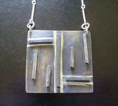 "This modern, hand-fabricated pendant is a mini abstract art piece that hangs boldly upon the neck, this piece is a favorite and always attracts admirers; created with oxidized sterling silver, Includes 18\" sterling silver chain (handmade chain pictured not included, please inquire for handmade chain option); measures approximately 1.25\" X 1.25\". Made to order, can be customized! FEATURES -Sterling Silver Pendant with linear, modernist design - Measures approximately 1.25\" wide by 1.25\" long - Includes 18\" sterling silver chain - Hand made to order SHIPPING - Handmade by DeLisa Designs in Austin, TX - Shipping included! Ships within 1 week via USPS Mail - Shipping option available for Express, Priority or signature confirmation - Gift wrapping option available at checkout, option to Geometric Modern Art, Gold Fringe Necklace, Jewelry Design Studio, Metal Jewelry Making, Modern Geometric Art, Contemporary Jewelry Design, Handmade Chain, Soldering Jewelry, Modernist Jewelry