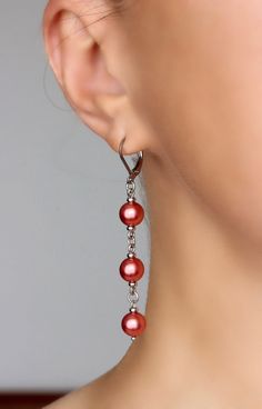 Unique pearl earrings with bright red-pink high quality czech glass pearl coated 8 mm beads, tiny stainless steel beads-separators, steel jumping ringa and stainless steel lever back earring hooks. Earring hooks are from nickel free and lead free metal. The total lenght of earrings is about 65 mm including earring hooks. Perfect jewelry for everyday wear and a great gift! Other earrings of my shop you can see here: https://www.etsy.com/shop/NaTavelli?section_id=13757927 Thanks for visit! Cheap Trendy Earrings With Dangling Beads, Cheap Red Dangling Beads Earrings, Cheap Red Beaded Dangling Earrings, Unique Cheap Earrings With Dangling Beads, Cheap Red Earrings With Faceted Beads, Cheap Red Dangle Earrings, Cheap Dangling Bead Earrings For Festive Occasions, Cheap Dangle Jewelry With Large Beads, Cheap Red Wire Wrapped Earrings