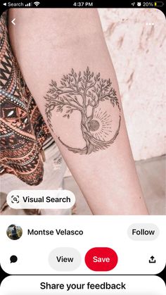 a person with a tree tattoo on their arm