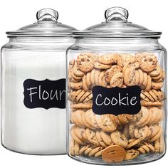 two glass jars filled with cookies next to each other