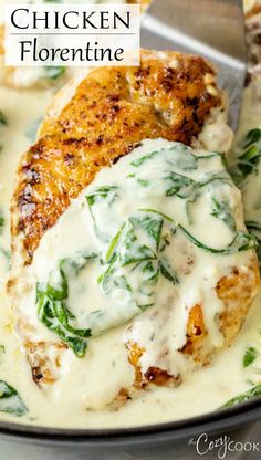 chicken with spinach sauce in a skillet ready to be eaten and served on the table