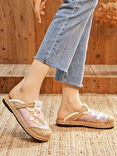 Ease through the day in these linen mules featuring a rope-wrapped sole for a boho-inspired effect and embroidered blooming for a summer looking. The anti-skid sole offers comfortable traction. 0.98" heel Slip-on Breathable linen & mesh upper Man-made lining Natural straw mat insole TPR sole Bohemian Spring Mules, Bohemian Closed Toe Espadrilles For Spring, Bohemian Slip-on Espadrilles For Spring, Harem Pants Jumpsuit, Cactus Rose, Silk Dress Short, Embroidery Shoes, Flower Shoes, Pattern Flower