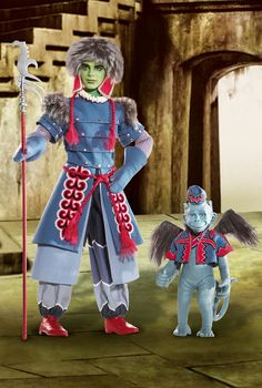 an animated image of a man and woman dressed in blue with red accents, standing next to each other