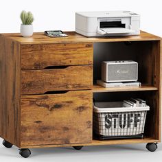 a wooden cabinet with two drawers and a printer on top