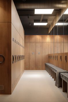 a row of wooden lockers in a public restroom