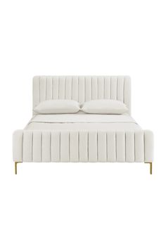 a white bed with two pillows on top of the headboard and one foot board