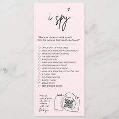 a pink bookmark with the words, i spy on it and an image of a camera