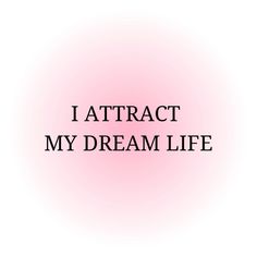 the words i attract my dream life are black and white on a pink background,