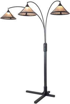 three light floor lamp with two lamps on each side and an iron stand underneath it