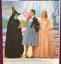 an advertisement for wizard magazine featuring two women and a dog wearing costumes from the wizard movie