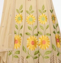 COLOR : Dull Yellow Cream FABRIC : Gown & Dupatta - Premium Silk WORK : Resham Embroidery, Hand Work, Sequins, Floral Motifs, Lace Border OCCASION : Wedding, Reception, Mehendi, Party Wear, Festival READY-TO-WEAR : No STITCHING : Available as semi-stitched fabric, can be stitched using standard size option (+$30). Note: There might be a slight color variation due to lighting and flash used during photoshoot. The bright shade seen is the best closer view of fabric's color. Semi-stitched Maxi Lehenga With Intricate Embroidery, Multicolor Embroidered Gown With Resham Embroidery For Eid, Anarkali Art Silk Dress With Intricate Embroidery, Multicolor Embroidered Gown With Resham For Eid, Multicolor Embroidered Gown For Eid, Semi-stitched Anarkali Gown With Resham Embroidery, Anarkali Gown With Resham Embroidery Semi-stitched, Semi-stitched Embroidered Gown For Eid, Eid Semi-stitched Embroidered Gown