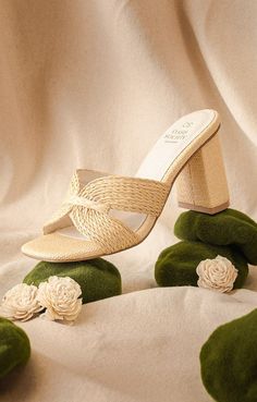 The perfect minimalist raffia heels to go with any summer outfit. -Slip-on style sandal -Round-toe -Heel Height: 35" -Runs true to size Raffia Shoes, Run For The Roses, In The Beach, Heeled Mules Sandals, Plus Size Activewear, Shoe Gifts, Round Toe Heels, Sneaker Wedge, Cuff Earrings